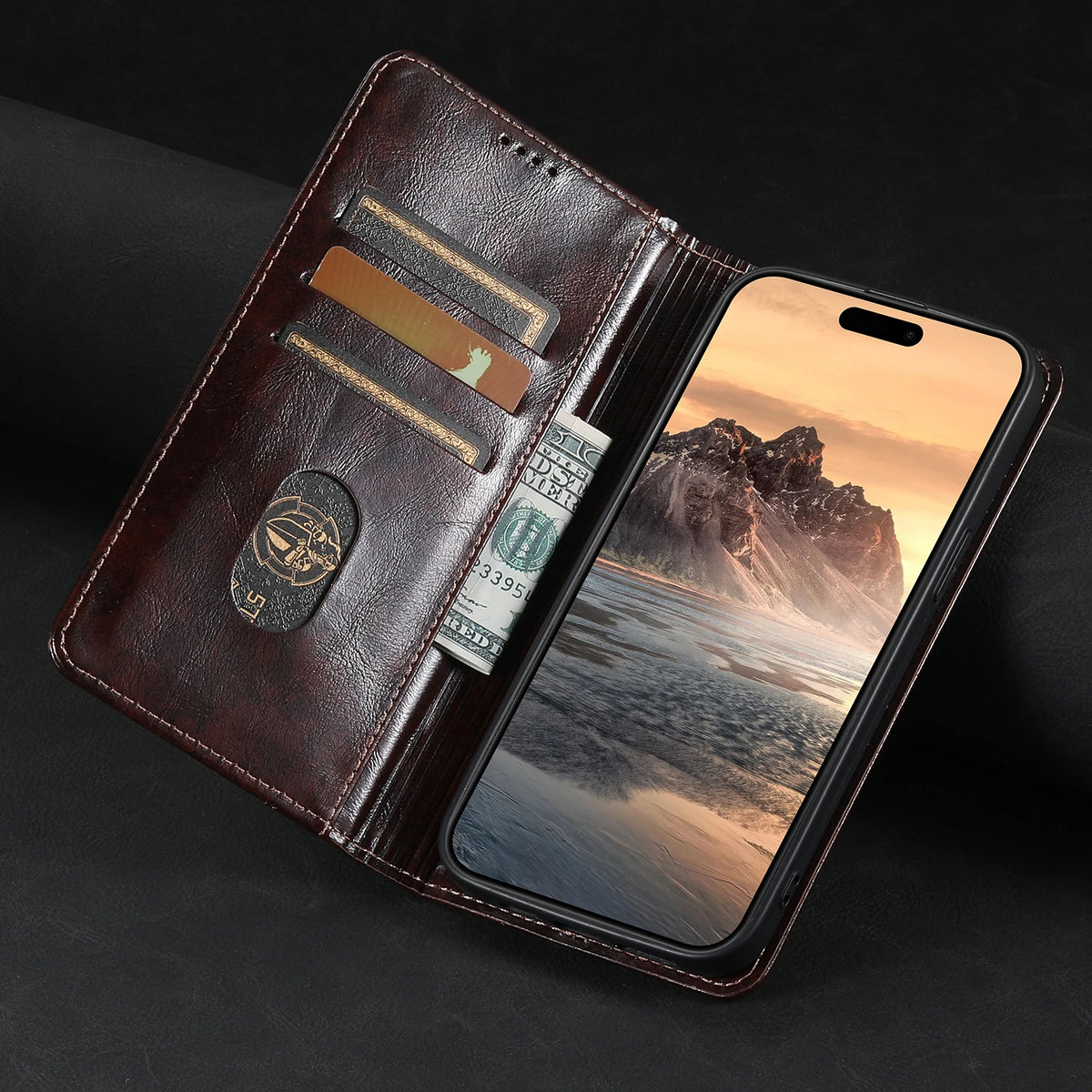 A brown leather flip case holds a smartphone and several cards.