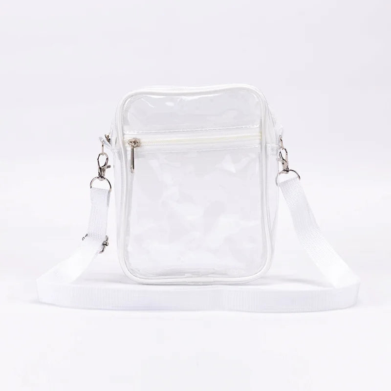 A clear transparent crossbody bag with an adjustable white strap displayed on a white surface.