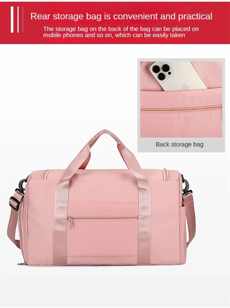 A pink travel duffle bag with a rear storage bag feature, shown from the front.