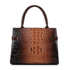A brown crocodile embossed PU leather shoulder handbag with a dark brown leather handle.