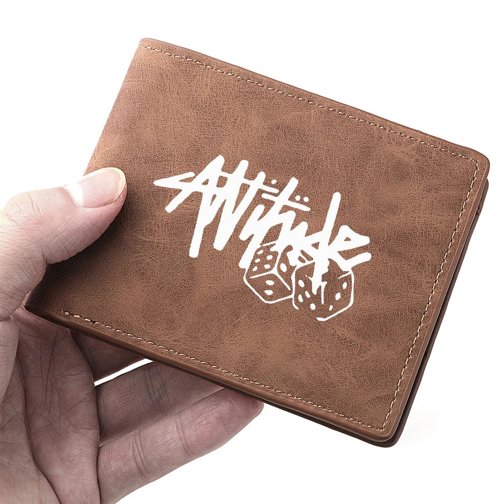 A brown PU leather wallet with white cartoon text and dice print being held by a hand.