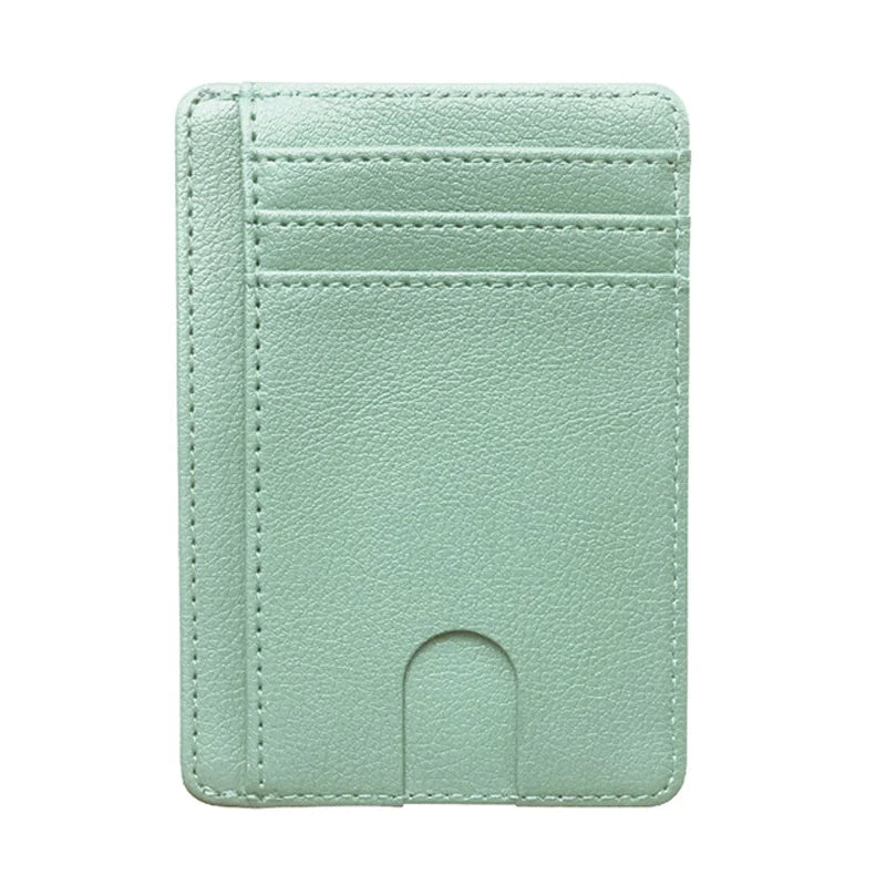 A light mint green slim leather wallet with a card slot and a fold-over design.