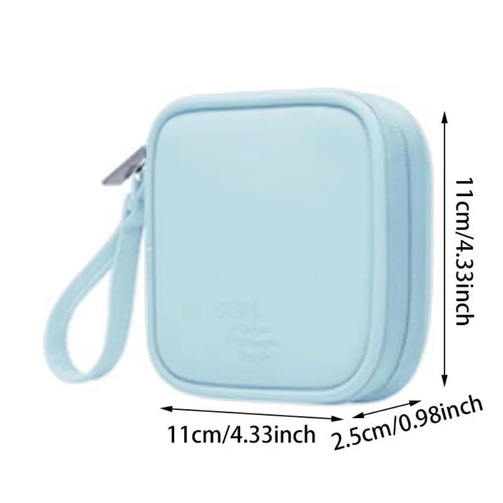 Bolsa portátil azul claro para guardar auriculares y pequeños aparatos electrónicos