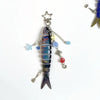 Silver simulation fish keychain with a star charm and various dangling charms