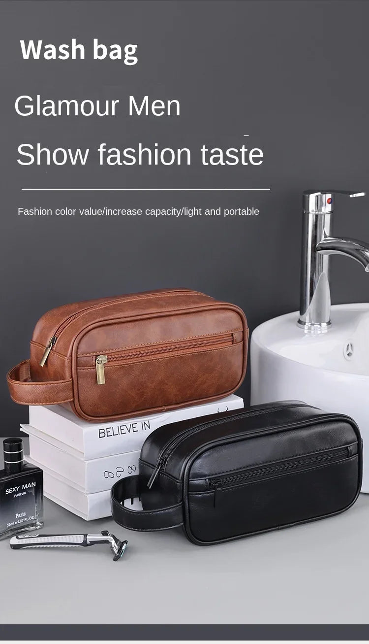 A brown leather wash bag and a black leather cosmetic pouch are displayed on a gray surface.