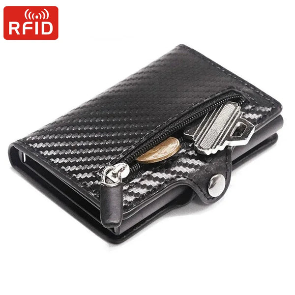 Black carbon fiber wallet with a zipper closure and a metal key attached.