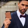 A man wearing a suit is holding a brown minimalist men's wallet with RFID blocking features.