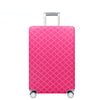 A bright pink heavy duty luggage protection cover with a diamond pattern and silver handle.