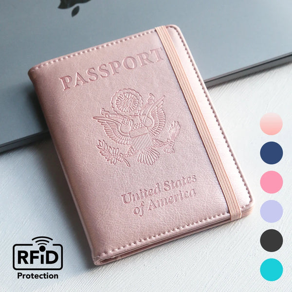 A pink RFID blocking PU leather passport holder with an eagle emblem and United States of America text.