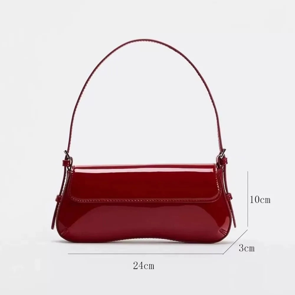 A maroon PU leather shoulder bag with an adjustable strap shown from the front.