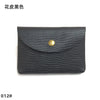 Black genuine leather card holder with a brass stud closure.