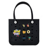 Sac de plage en caoutchouc EVA noir et imperméable avec plusieurs petits articles décoratifs