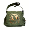 A dark olive green vintage canvas shoulder bag with a circular nature illustration featuring a bird and trees.