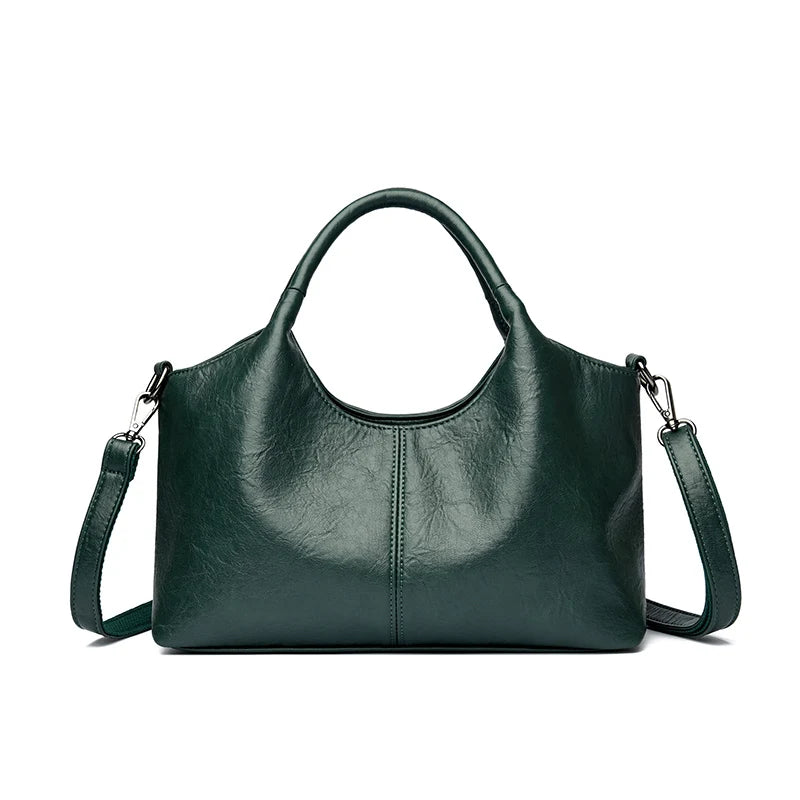 A dark green leather casual crossbody shoulder bag with a zip closure.