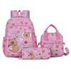 A set of pink cartoon animal backpacks featuring bears and other cute characters.