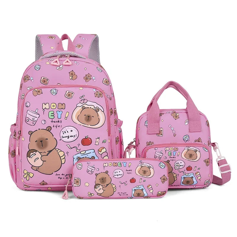 A set of pink cartoon animal backpacks featuring bears and other cute characters.