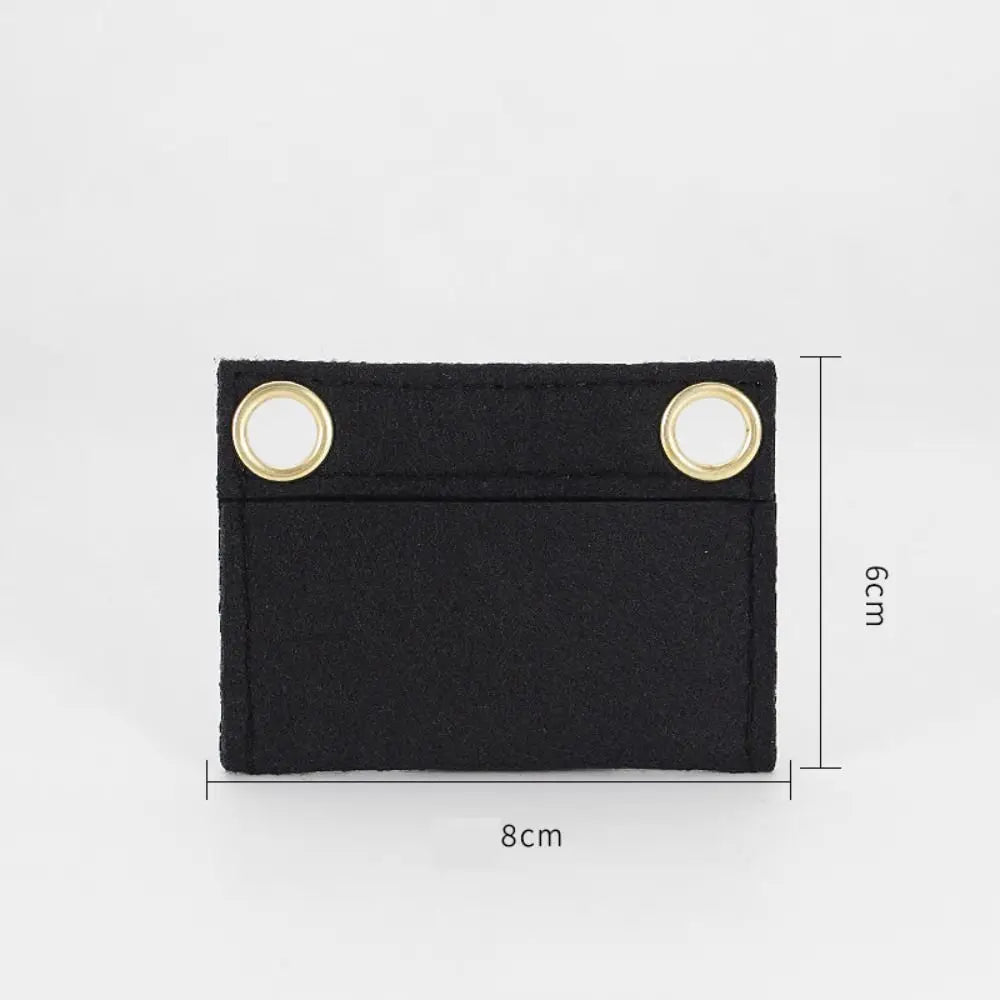 Black elegant chain strap for handbags and crossbody bags with gold-colored hardware