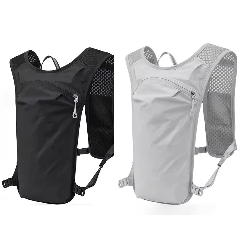 A black and gray hydration vest backpack for running and cycling.
