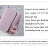 A pink and light blue wallet or card bag is shown being held, displaying various slots for cash, cards, and a mobile phone.