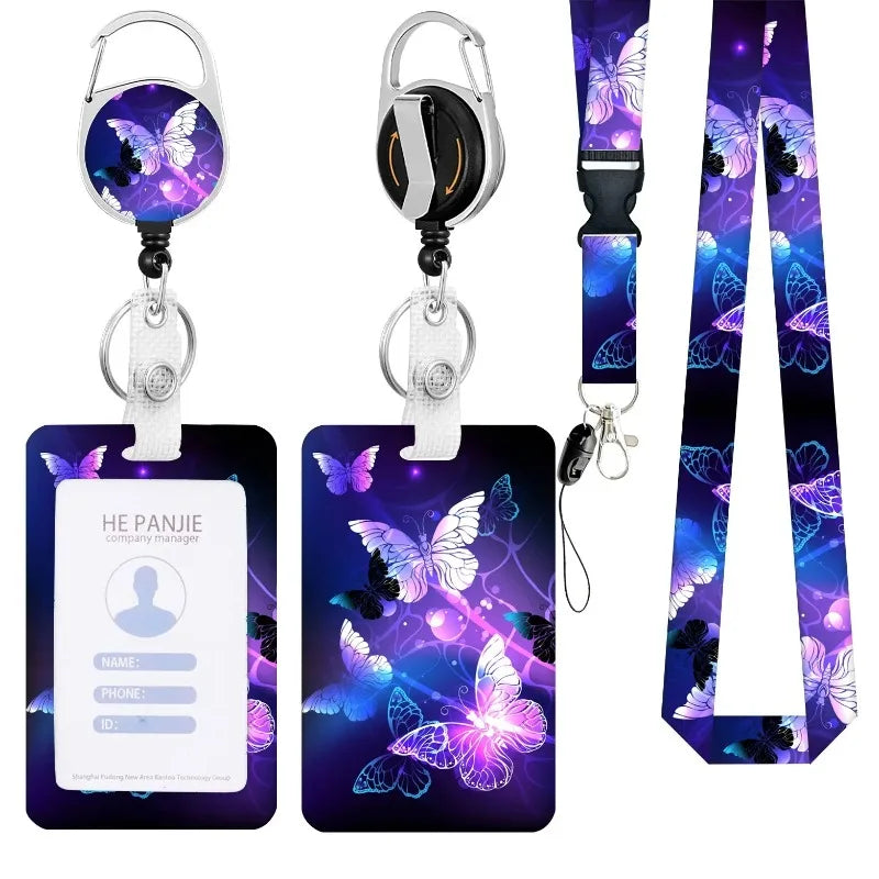 A purple and blue butterfly themed retractable badge reel with a silver clip and black lanyard.