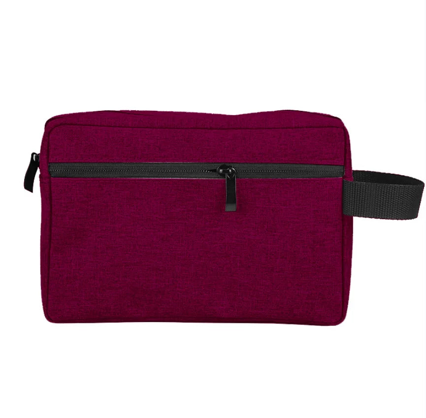 Sac organisateur de toilette imperméable violet foncé avec fermeture éclair et sangle noire.