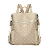 A beige genuine leather women's backpack with tan straps and gold hardware.