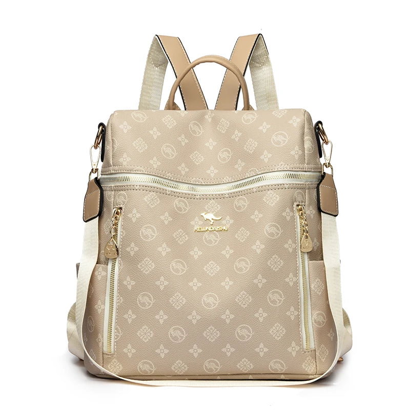 A beige genuine leather women's backpack with tan straps and gold hardware.