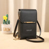 A black leather Endaycon luxury women's crossbody shoulder bag with gold hardware resting on a light wooden surface.