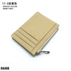 A tan genuine leather zipper card holder with a silver clasp.