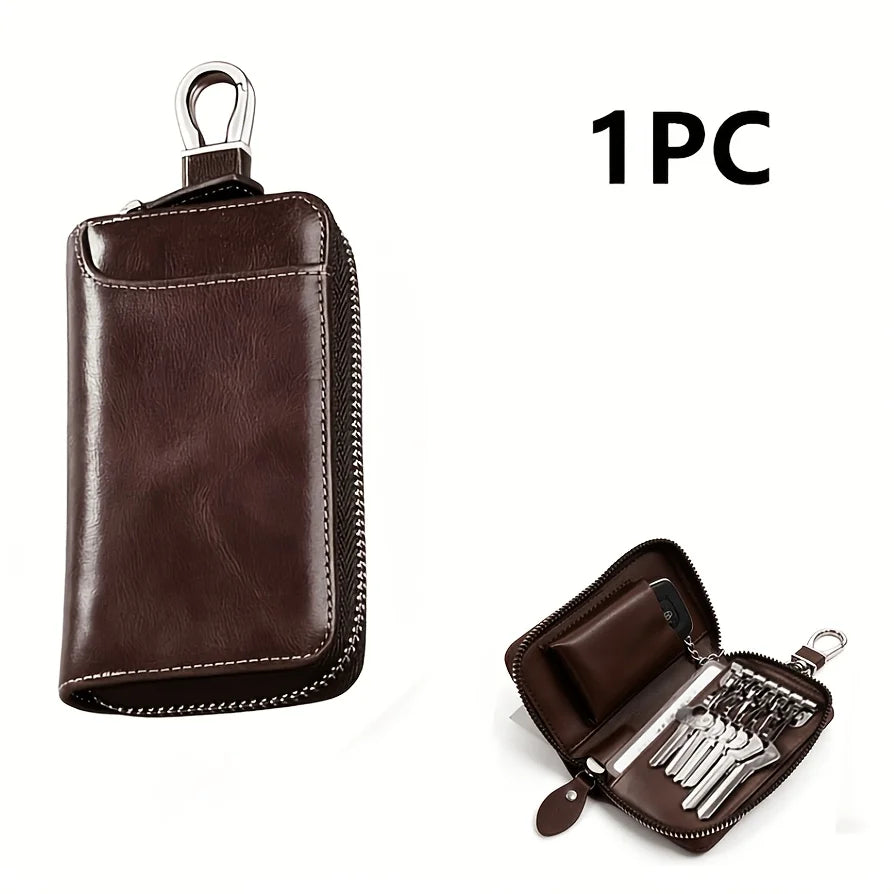 A brown compact PU leather key organizer wallet with a leather flap and multiple keys inside.