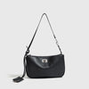 A black classic split leather shoulder tote bag with a long strap is shown against a light gray background.