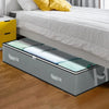 A dustproof under bed storage box with reinforced handles is placed beneath a white bed frame.