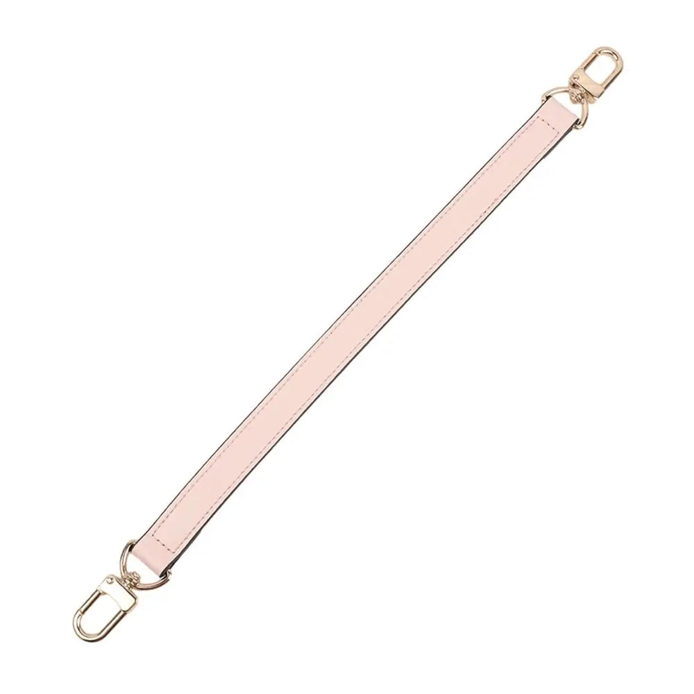 A beige genuine leather replacement shoulder strap with gold-toned hardware.