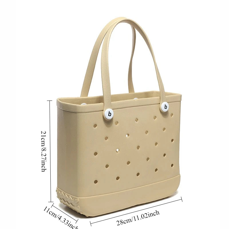 A beige portable EVA beach tote bag with a handle and perforated design.
