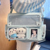 A light mint green transparent PU crossbody bag featuring two white stuffed bears and a portrait inside.