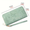 Cartera de tarjeta de cuero PU floral en verde menta claro con su correa.