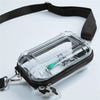 A clear plastic cosmetic bag with a black strap and metal clasp is shown against a white background.