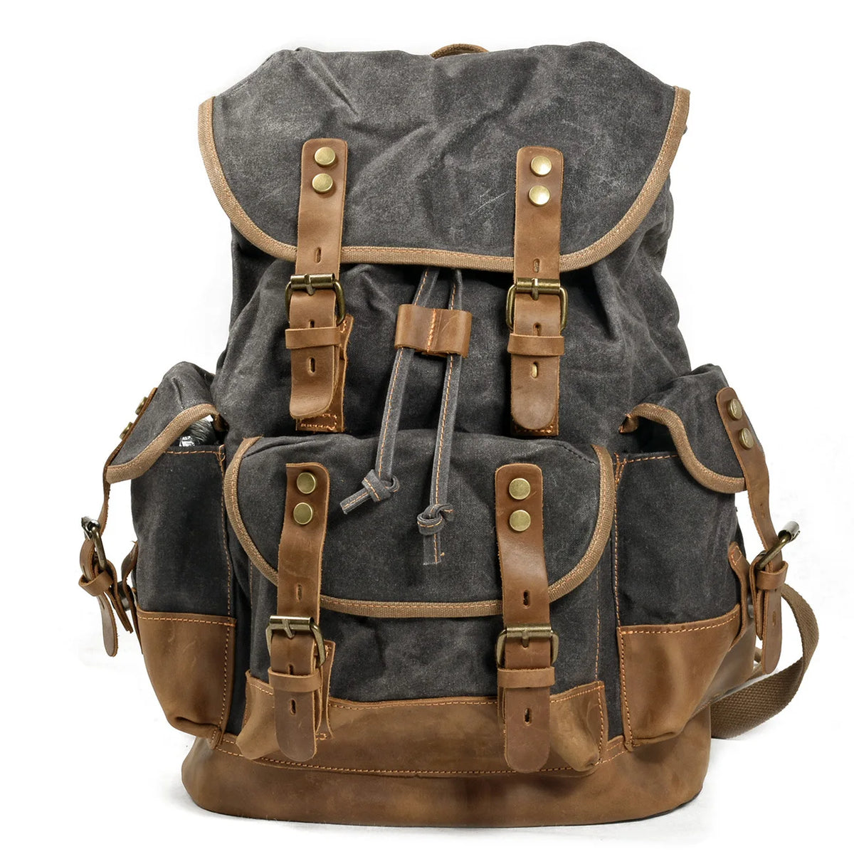 Mochila de senderismo de lona gris oscura con detalles y correas de cuero marrón.
