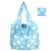 Light blue reusable nylon tote bag featuring a pattern of white bear faces