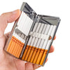 A hand holds an open premium metal cigarette holder displaying several white and orange-colored cigarettes.