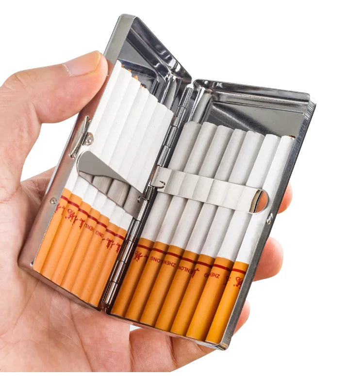 A hand holds an open premium metal cigarette holder displaying several white and orange-colored cigarettes.