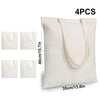 Quatre sacs en toile de coton blancs avec poignées beige clair, présentés verticalement.