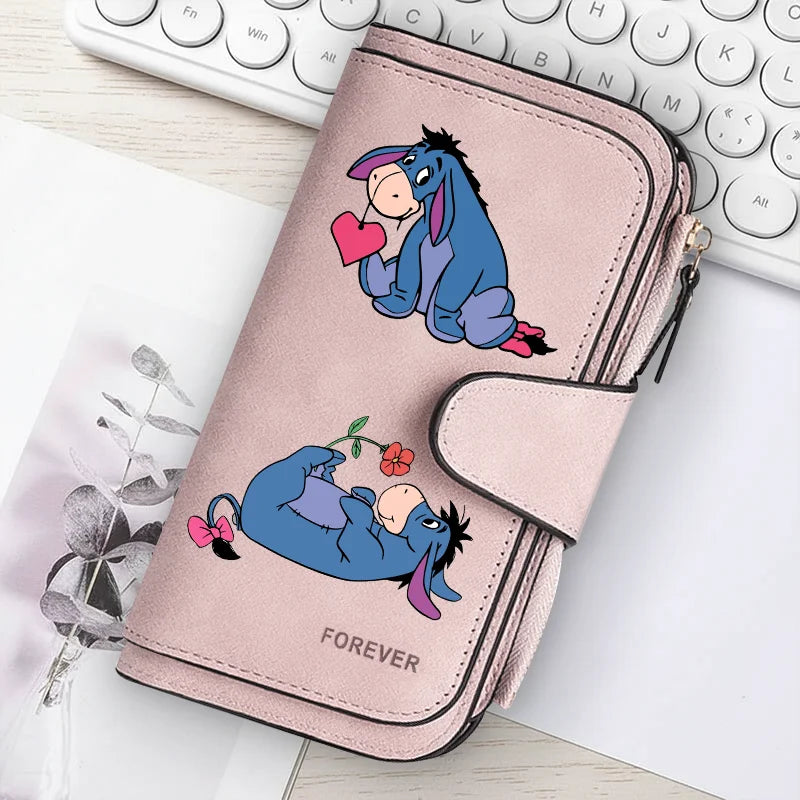 A pink women's long zipper handbag coin purse featuring a cute blue donkey illustration.