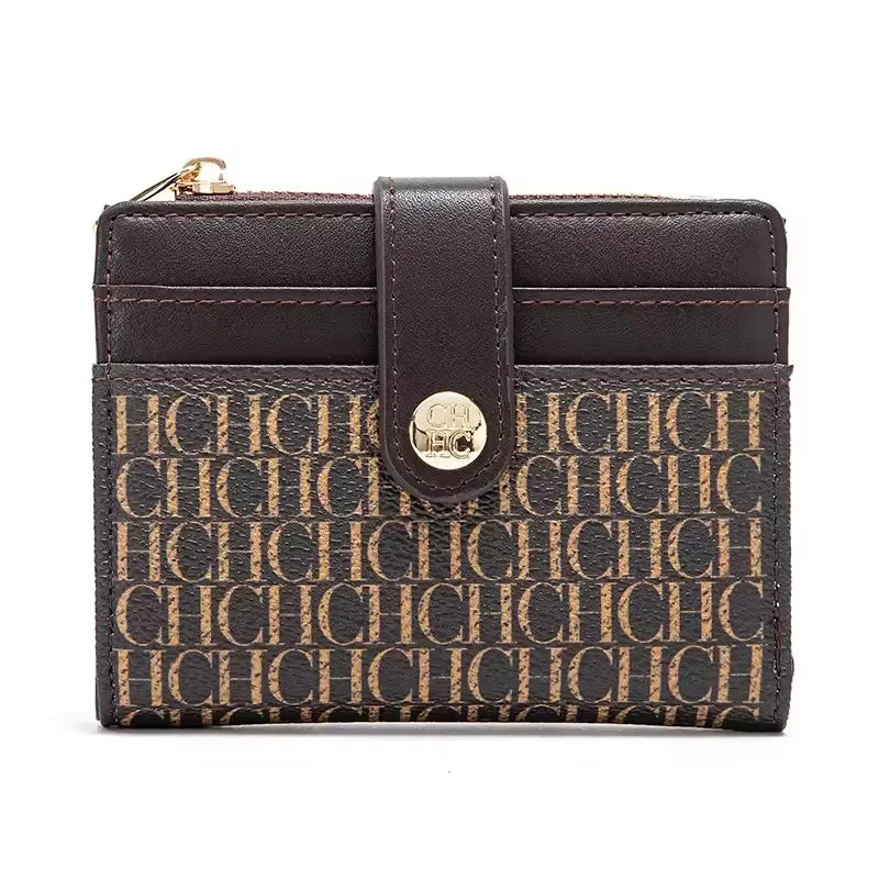 A dark brown leather folding wallet with a gold accent, featuring an all-over monogram pattern.