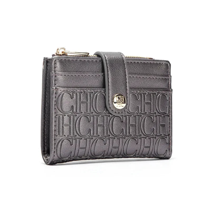 A dark gray leather square folding wallet with gold hardware and embossed initials.