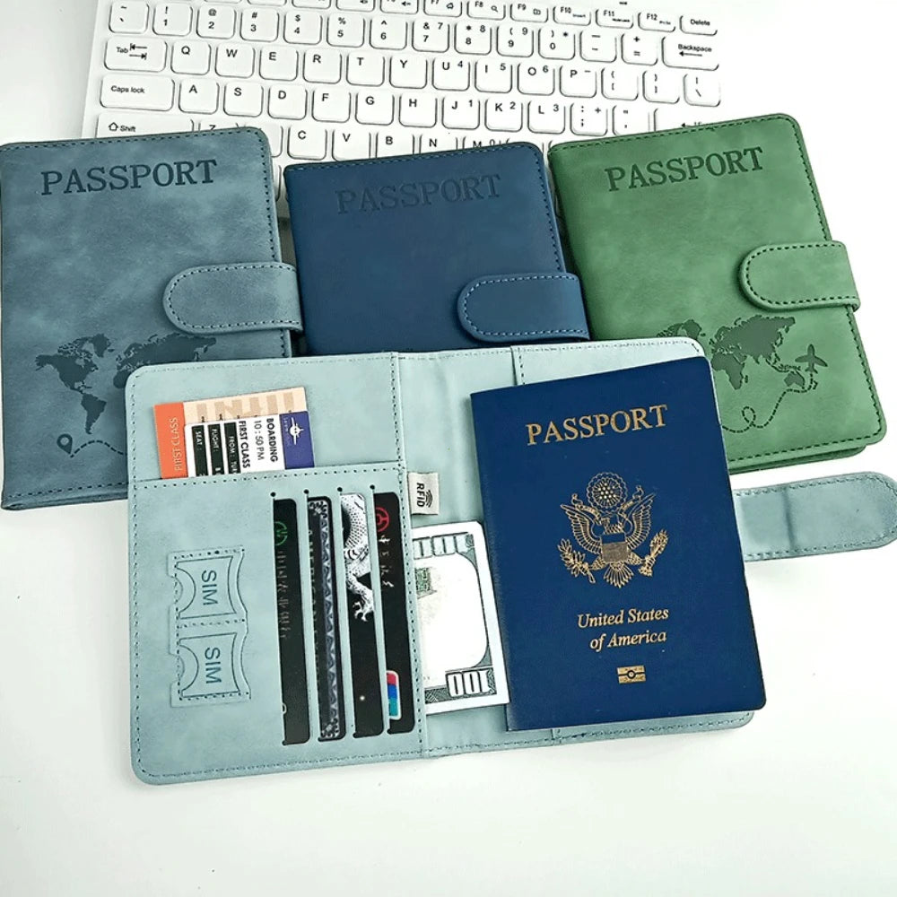 A teal passport holder with a leather cover and multiple SIM cards and documents inside.