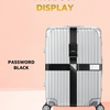A silver-colored piece of luggage with a black cross strap and bundling belt displayed against a light pink background.