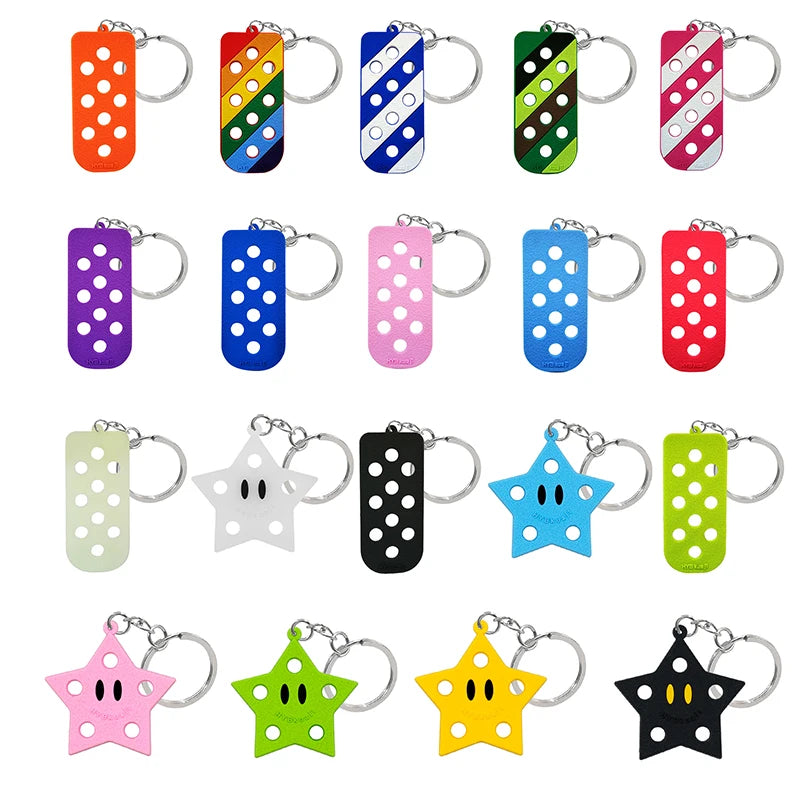 Collection de porte-clés et de charmantes clés en silicone pour chaussures, dans diverses couleurs et designs.