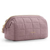 A mauve padded makeup bag with a gold zipper and wide-open design.