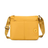 A mustard yellow waterproof nylon crossbody bag with a leather strap and gold-toned hardware.